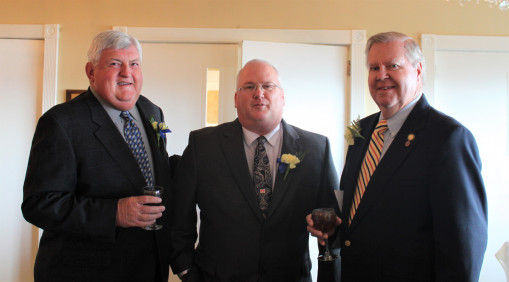 Ed Donohue poses with fellow inductees Gary Henderson '63 and Brian Giorgis at the Athletic Hall of Fame Induction in 2011.
