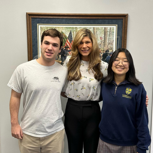 Our Lady of Lourdes Principal, Meghan Vilardo with Matthew DeMelo and Isabella Cho.